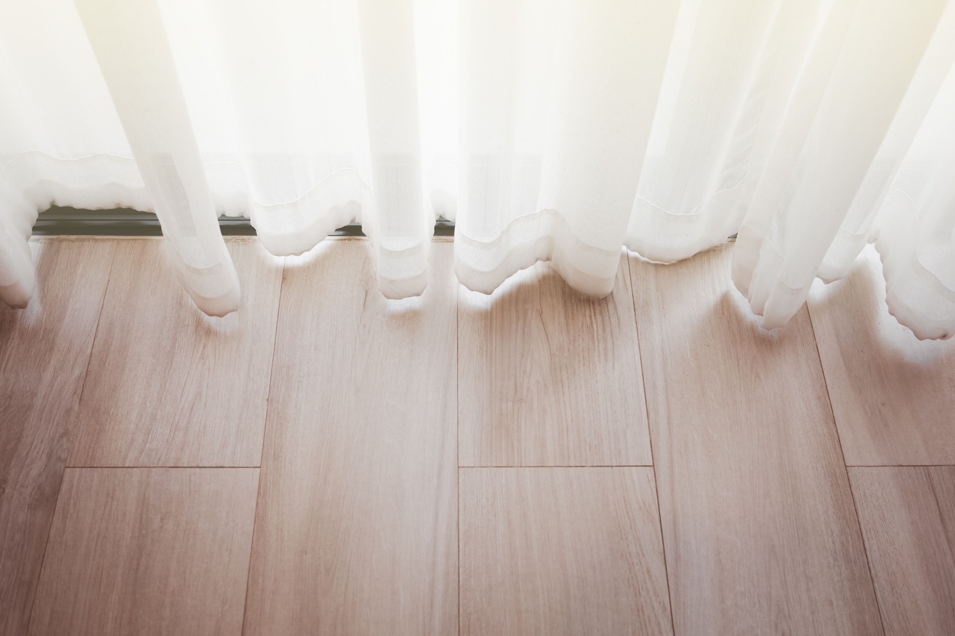 transparent curtain and wood floor